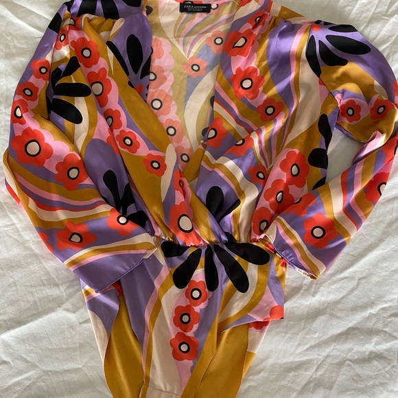 Buttery material with floral print. No front closure. Purchased from Zara - Picture 2 of 3